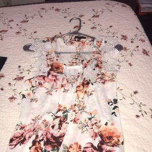 Loose blouse. Worn once. Floral design.